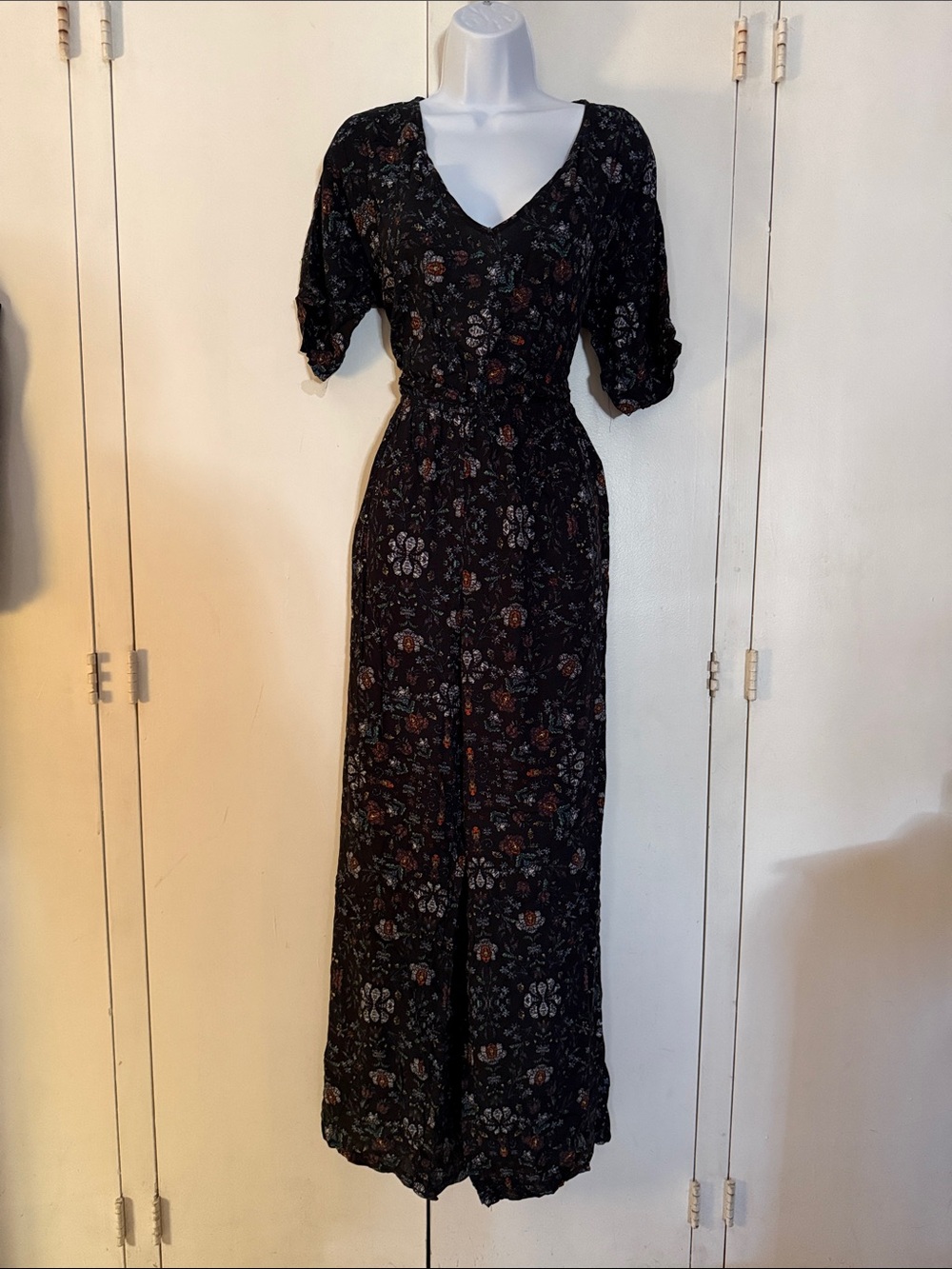 lovestitch Black Floral V-Neck Jumpsuit with Rust and Green Accents